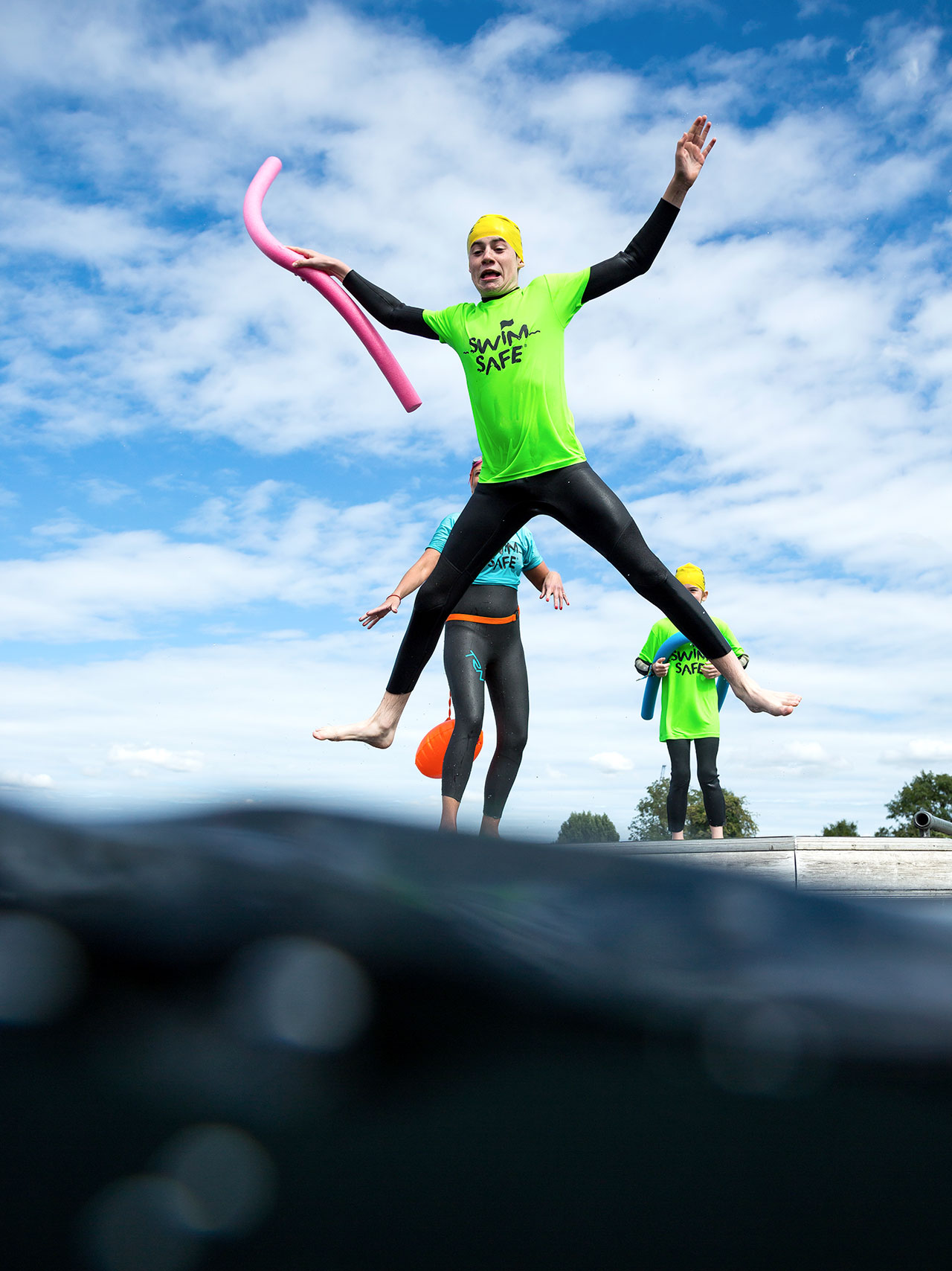 Child jumping into water