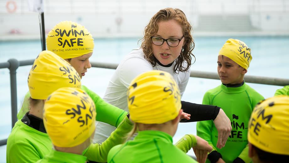A Swim Safe instructor teaching children at Plymouth's Tinside Lido in Devon